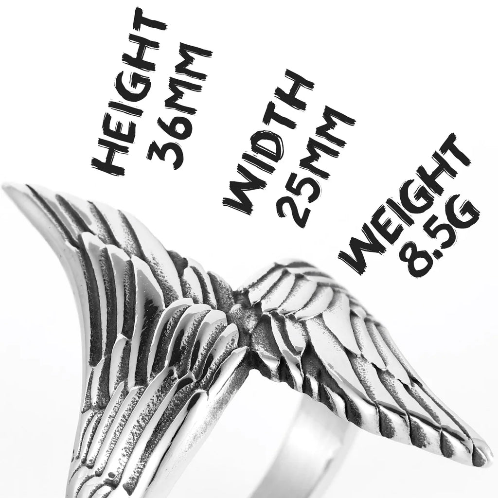Silver winged ring with measurements on a white background