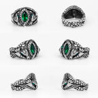 Silver rings with green gemstones on a white background