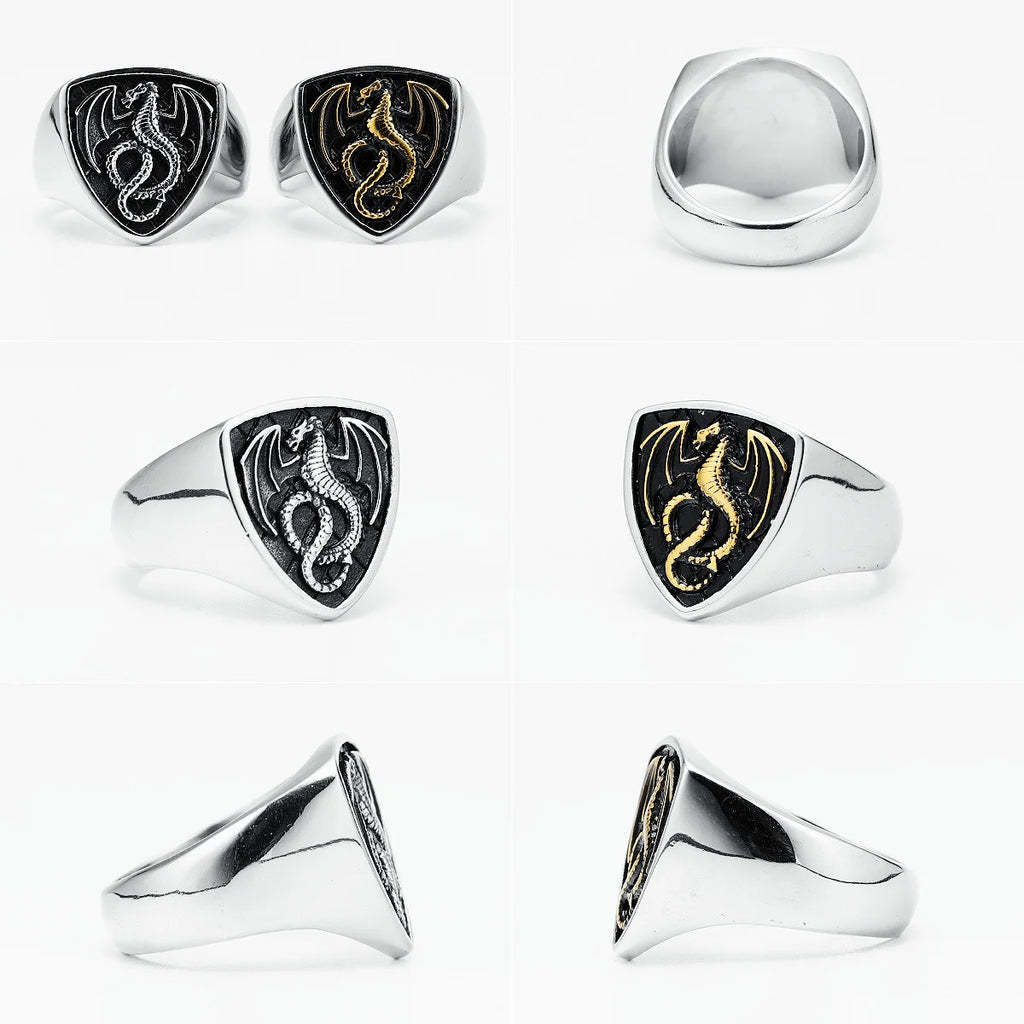 Collection of silver rings with dragon designs on a white background