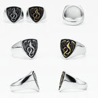 Collection of silver rings with dragon designs on a white background