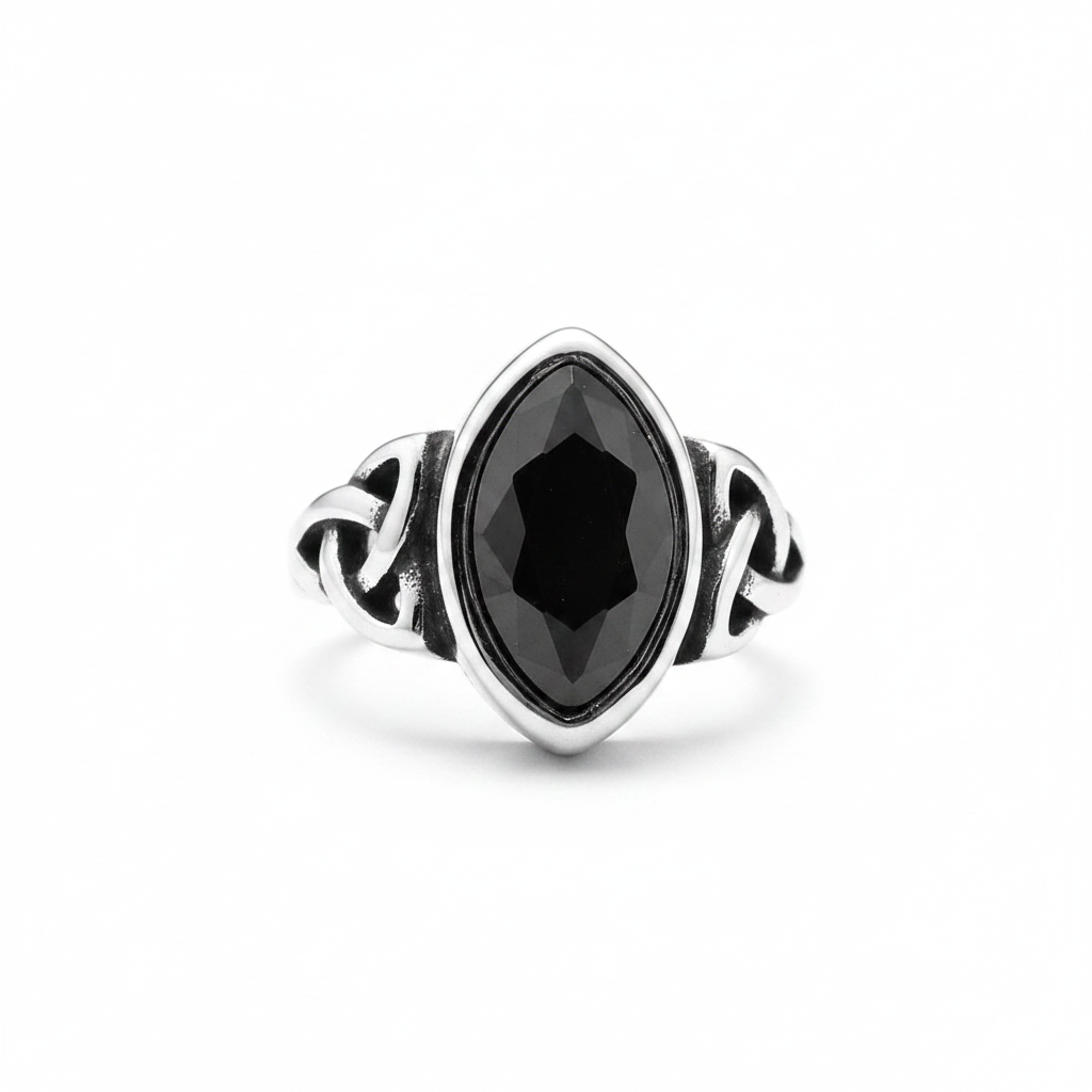 Silver elven themed ring with a black gemstone on a white background