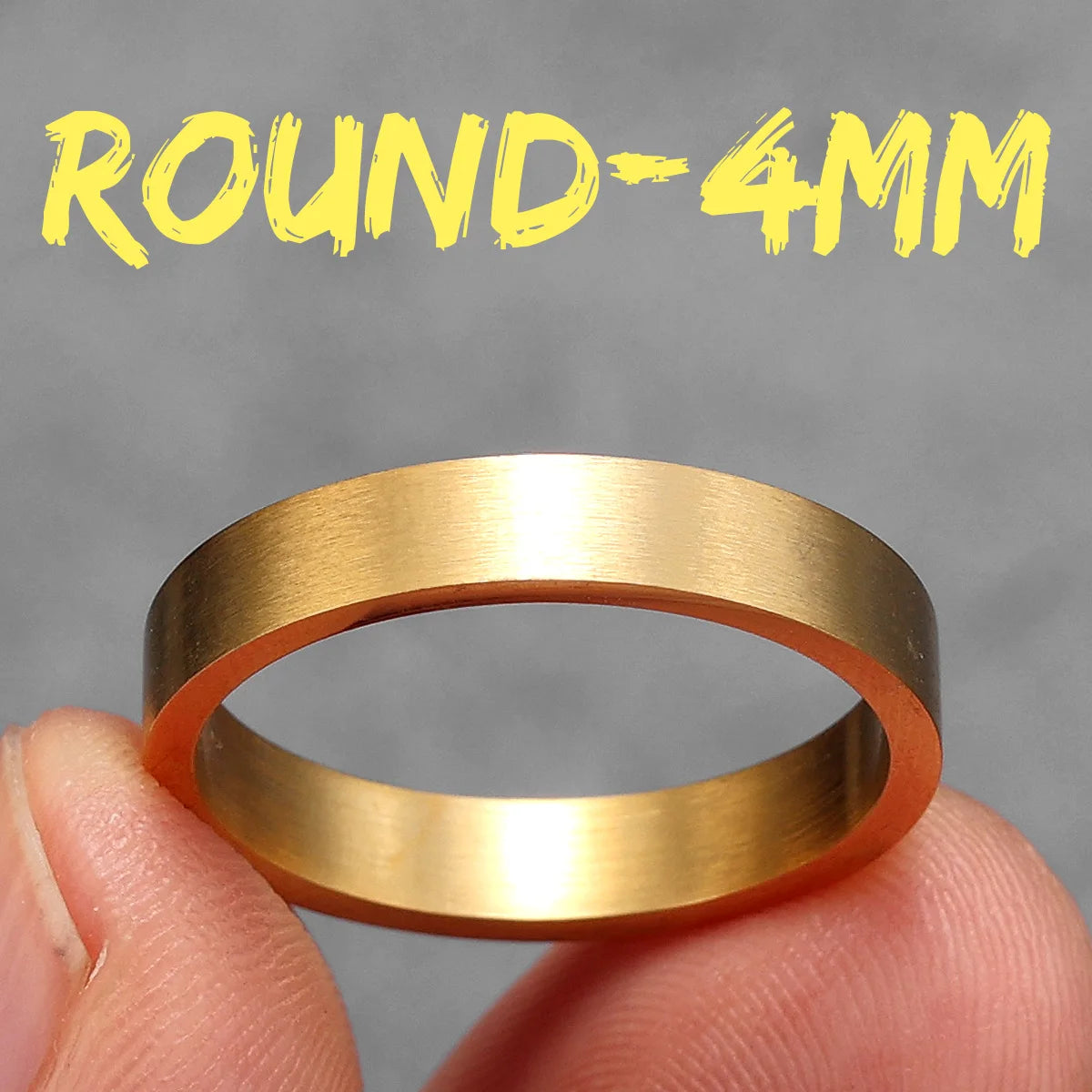 Gold ring held between fingers with 'ROUND-4MM' text above on a grey background