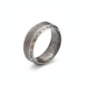 Silver ring with intricate Norse Viking design on a white background
