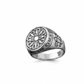 Silver ring with intricate design on a white background