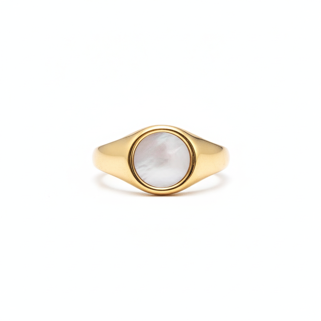 Gold ring with a circular flat stone design on a white background