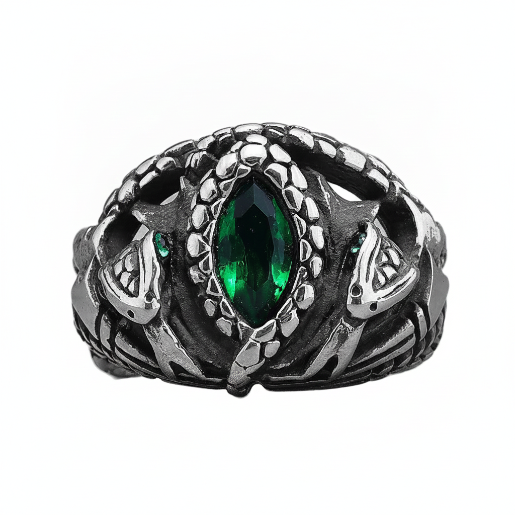 Silver serpent's ring with green gemstone on a white background