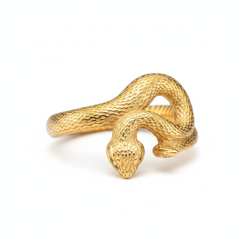 Gold snake-shaped ring on a white background