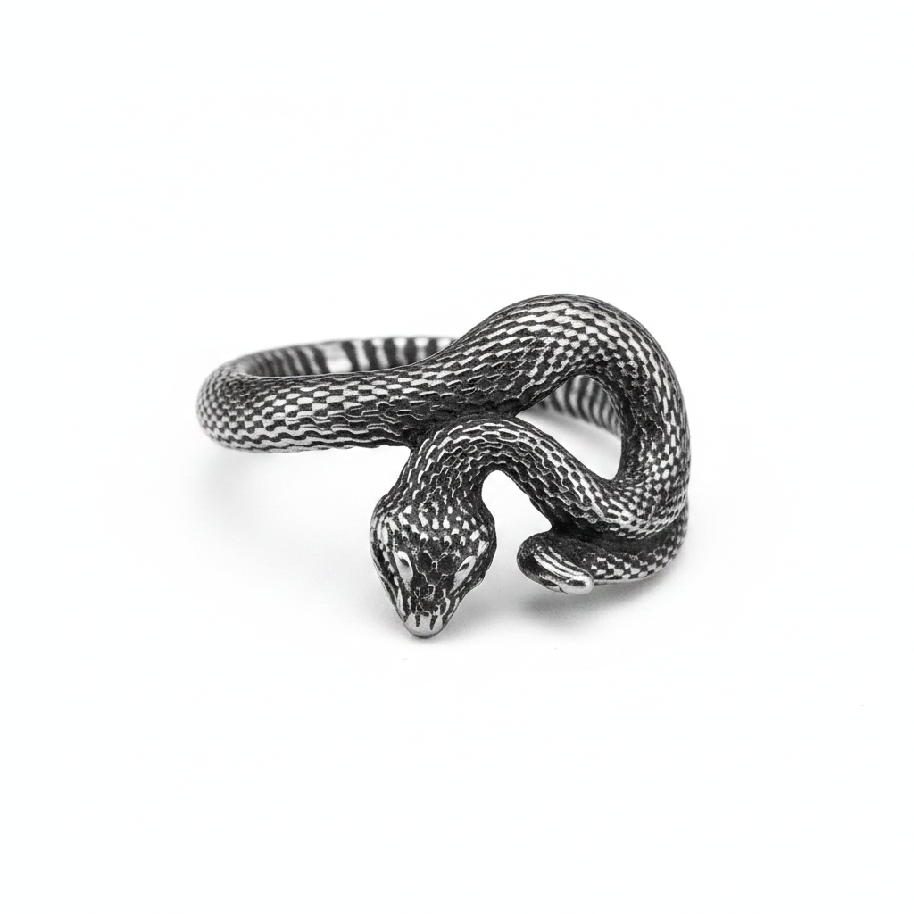 Silver snake-shaped ring on a white background