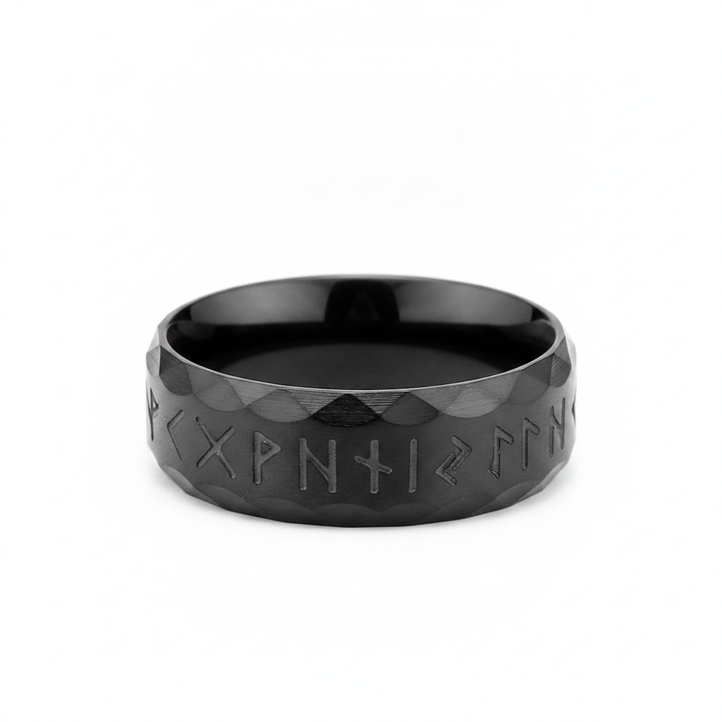 Black stainless steel runic Viking styled ring on a white background