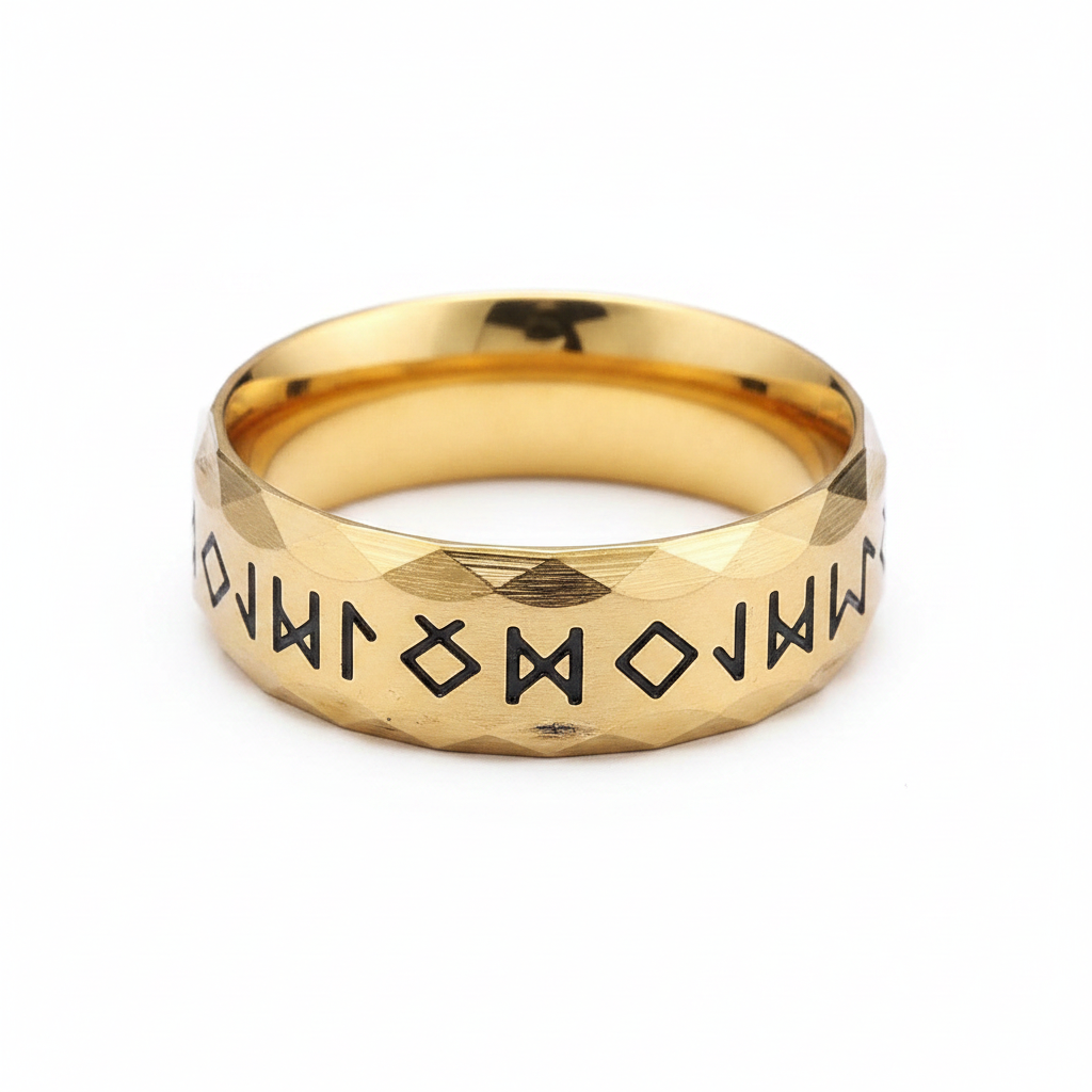 Gold stainless steel runic Viking styled ring on a white background